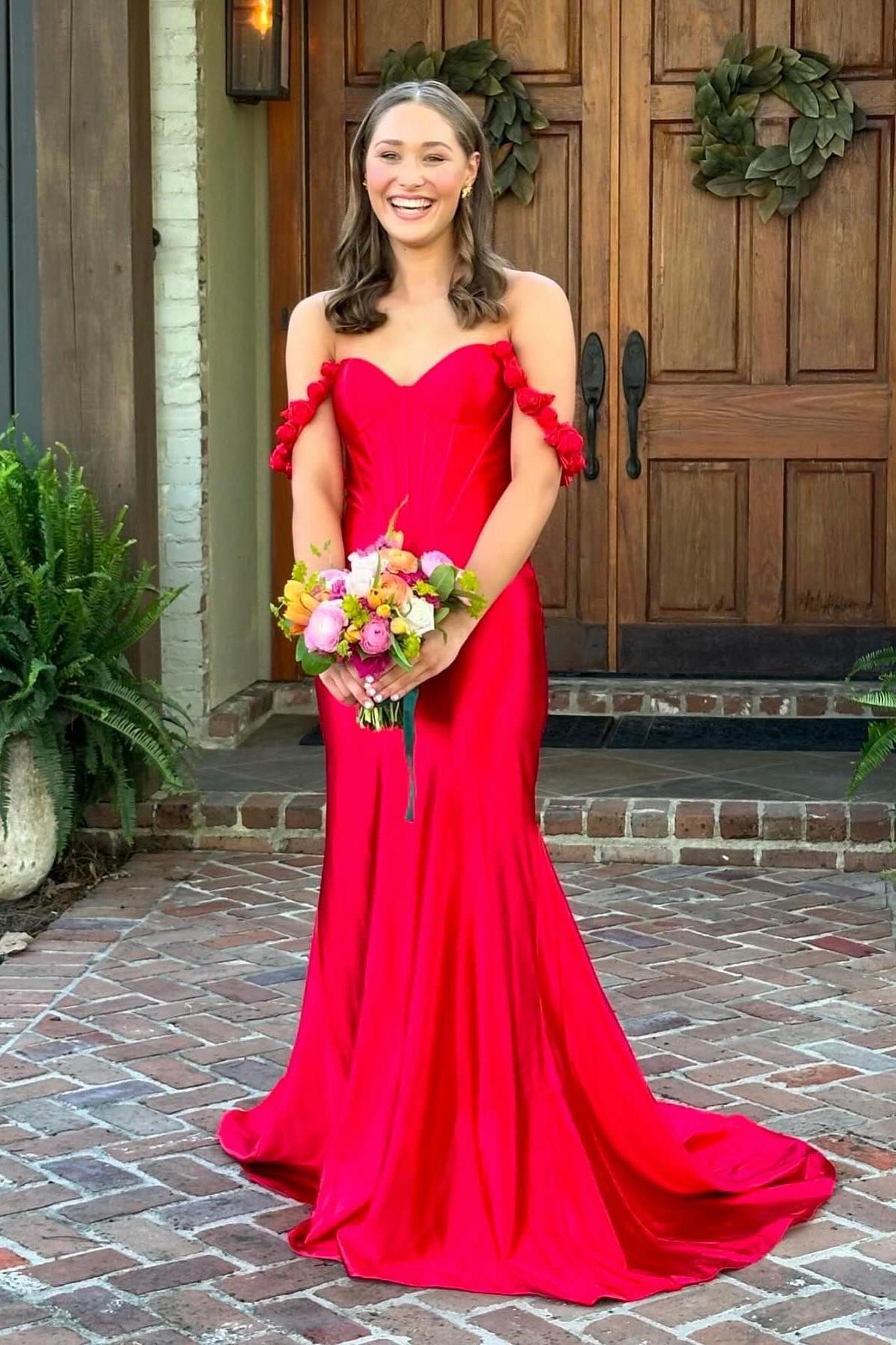 prom flowers with hot pink dress Hot pink & a little wild flowers. . Hot pink has always been my favorite color so I maybe a little partial. . Both of you looked perfect. send us